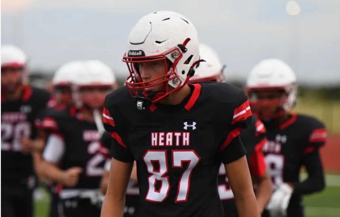 Tristan Libby in helmet and Heath Hawks jersey 87